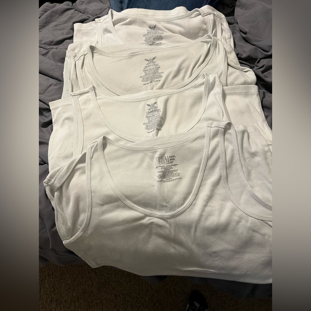 Lot of white tanks